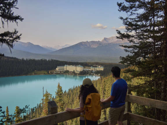 A couple hiking around Lake Louise, ALberta - Banff National Park